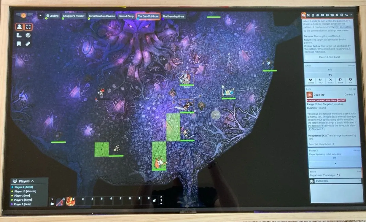 A TV laid flat on the table showing a Foundry map